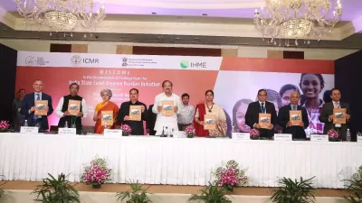 representatives from IHME and the Indian government hold a report on burden of disease in India
